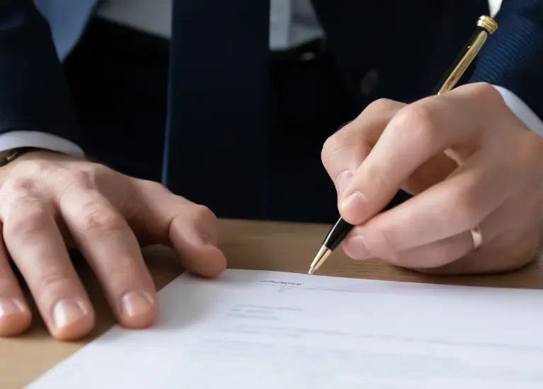 A person signing a document
