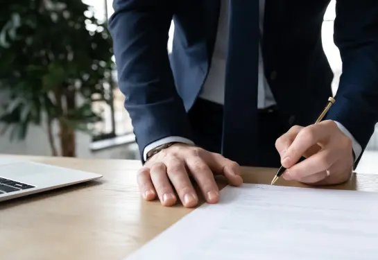 A person signing a document