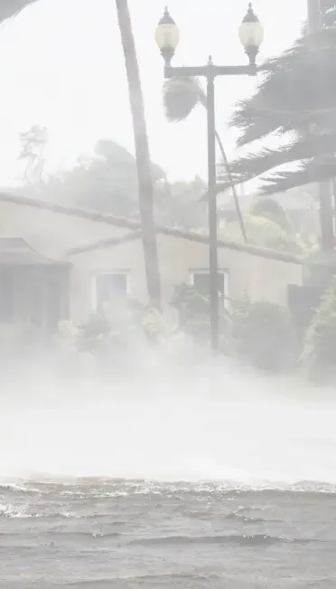 A house with water spraying on it